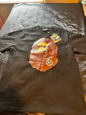 Bape Black Tee with Orange Ape Head and Yellow Details